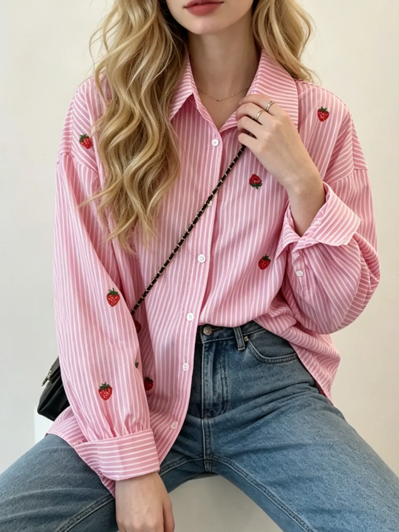 A fashionable pink strawberry striped Blouse shirt for women, with a hanging fabric that is breathable and suitable for commuting, shopping, outdoor activities, indoor and outdoor wear
