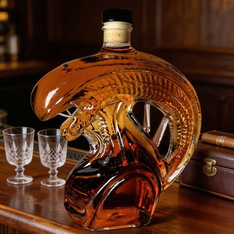 The Monster Decanter—an alien-themed glass decanter inspired by classic movie monsters. An exceptional collectible, it seamlessly combines the practical function of holding spirits with the decorative aesthetic of a creative display piece. (Glass)