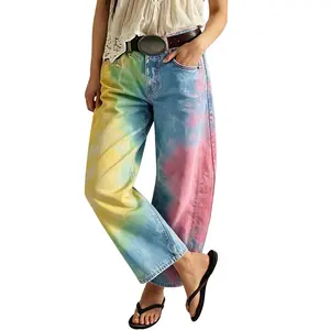 Women's vintage-wash wide-leg jeans; Y2K-style loose-fitting trousers; soft pink base with a bohemian floral print; suitable for year-round outdoor activities and streetwear styling.