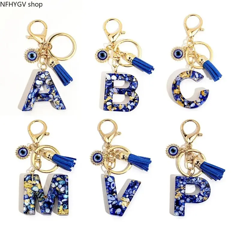 Royal Blue Alphabet Pendant In A-Z Options Designed With Flowy Tassel And Fabric Decor, Lucky Evil Eye Charm Adds Bohemian Vibe, Lightweight Portable Bag Accessory Perfect For Daily Backpack Carry And Handbag Fashion Styling