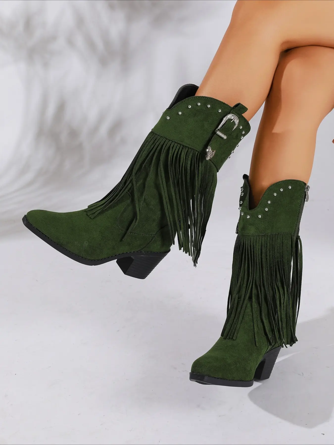 Fringe western mid-calf boots decorated with rivets and buckle, pointed toe block heel, side zipper retro cowboy boots for women.