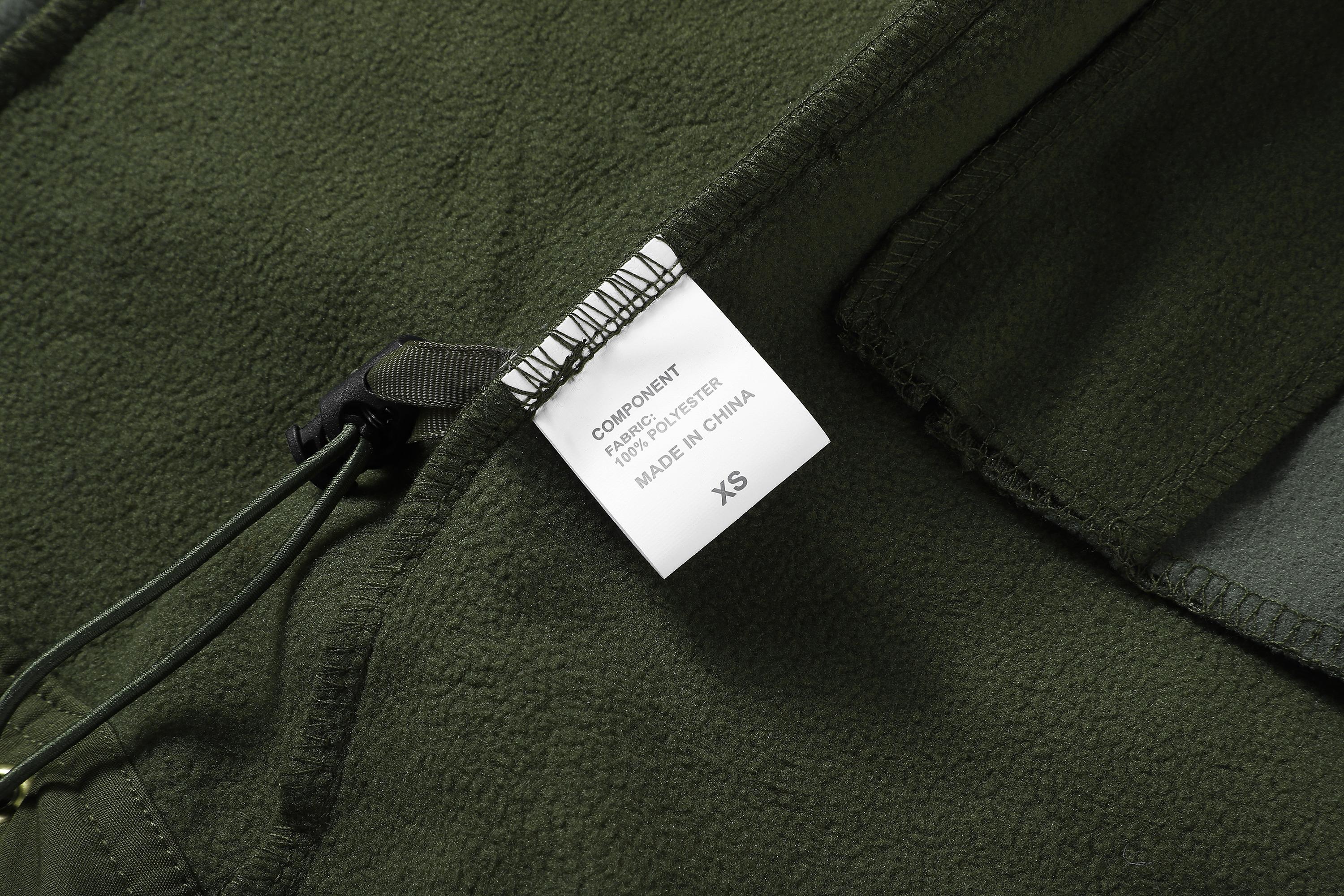 A men's hooded jacket with an outdoor and functional style features multiple zipper pockets distributed on the chest, arms, etc., making it convenient to store various small items and highly practical. Hood with drawstring closure