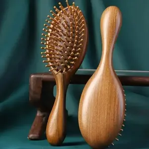 Sandalwood paddle‑style hair brush with 104 rounded ball‑tip bristles. Anti‑static wooden comb gently massages the scalp while untangling knotted strands. Practical daily‑home hair‑care grooming essential for soothing and styling all hair‑types