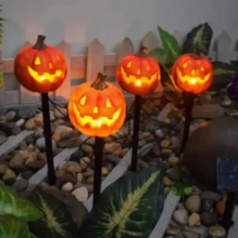 4pcs Halloween Solar Pumpkin Stake Lights Waterproof LED Jack-O-Lantern Garden Pathway Lights Outdoor Yard Lawn Halloween Decorations,Ground Light,Outdoor Atmosphere Decoration lamp, Cute Resin Pumpkin Head Courtyard Landscape Lights.