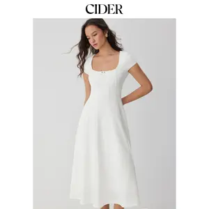 Cider Scoop Neck Short Sleeve Rosette Flared Maxi Dress