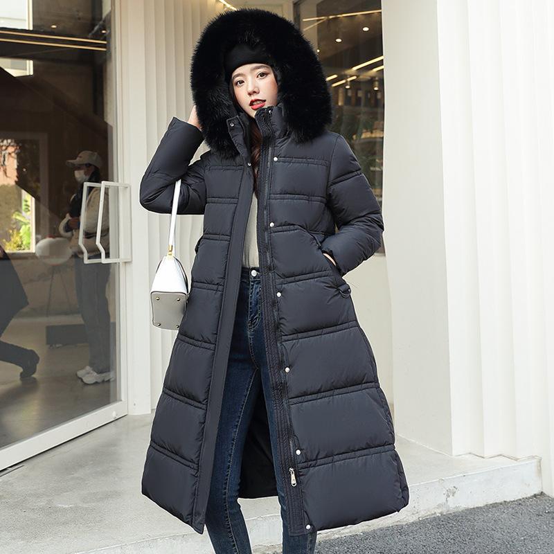New winter women's thickened long over-the-knee hooded cotton-padded coat with large fur collar.
