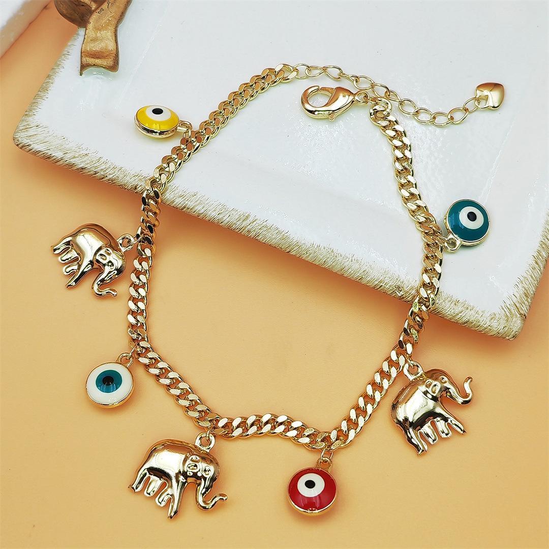 Gold Devil's Eye Lucky Elephant AnkletY2K Aesthetic Red Evil Eye Pendant Anklet Adjustable Gold Plated Chain Anklet for Party Birthday Holiday Gift Daily Wearwith Baby Elephant Pendant Adjustable Length for Stylish Accessory