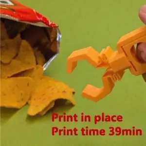 Mini Robotic Snack Grabber Claw – Hygienic Anti-Dirty Hands for Chips & Candy. Perfect for Gaming, Office & Parties. Great Fun for Snack Lovers.