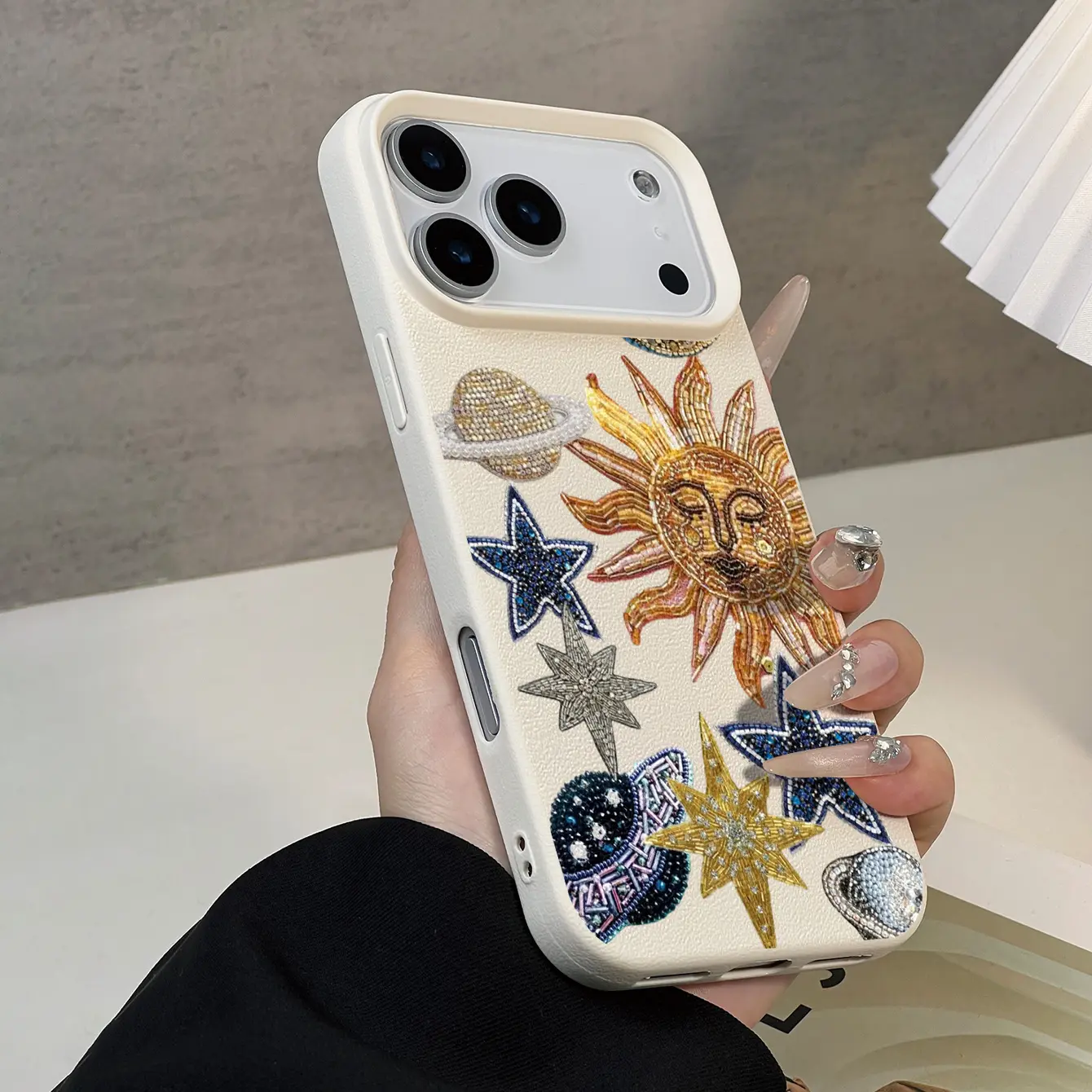 Drop-resistant and non-slip TPU phone case featuring an embroidered starry pattern and a textured leather-like finish; compatible with iPhone 17, 16, 15, 14, 13, 12, 11, XS, X, and other models-an ideal gift for friends or family.