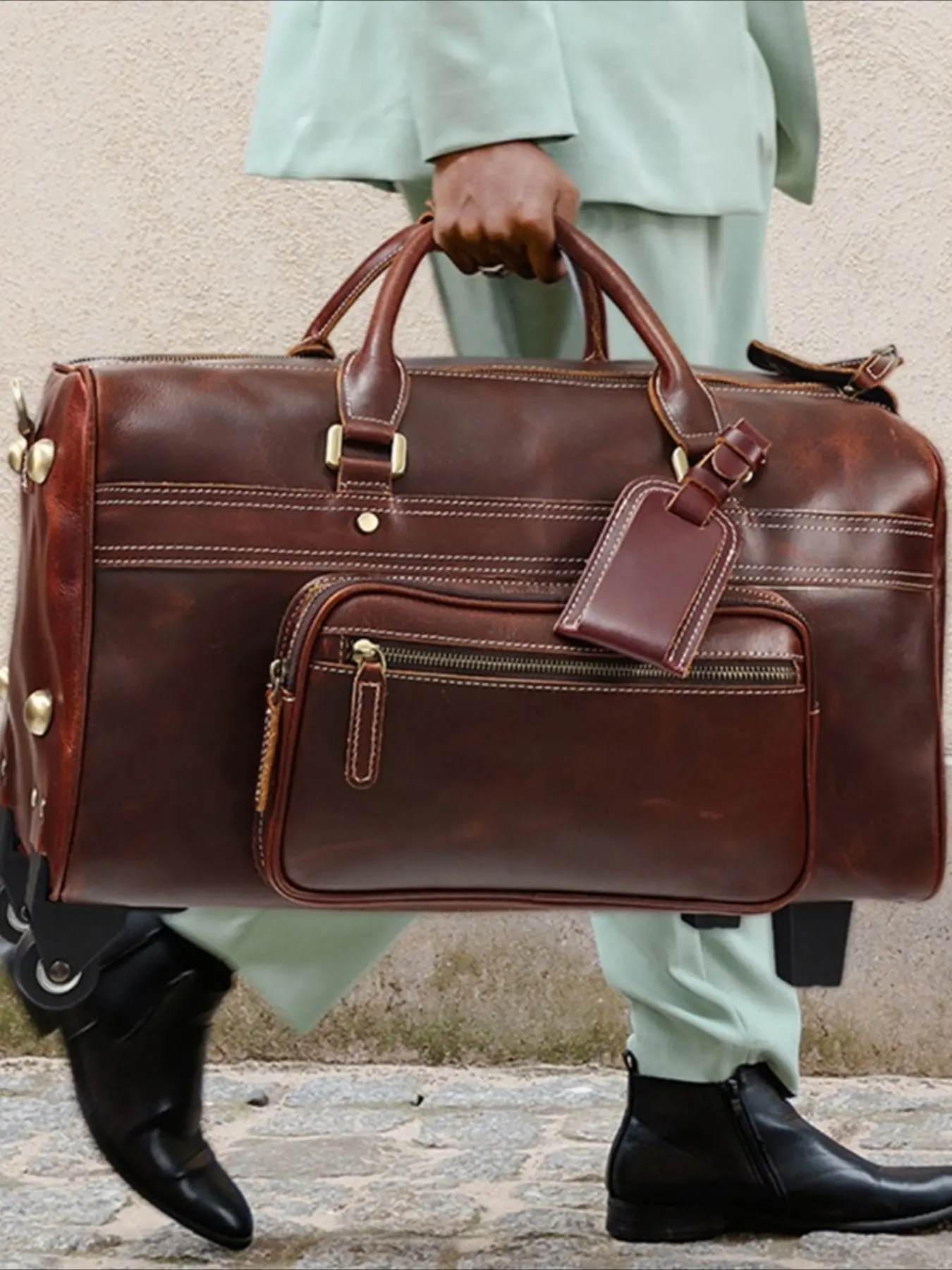 The first layer of cowhide large-capacity luggage with wheels, business trip tie rod bag, genuine leather retro hand-held travel bag, men