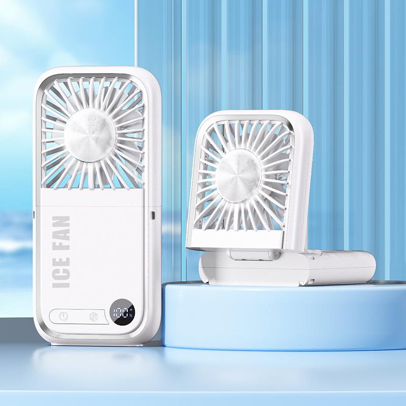 tylish and versatile personal fan with digital display, foldable design, and dual-use for neck hanging or handheld. Built with ice compress cooling technology, USB rechargeable, ultra-portable for outdoor, travel, office and daily use. Low noise, strong w