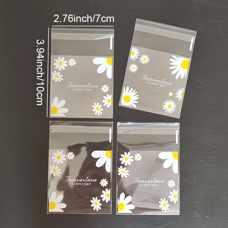 100pcs daisy print gift bag, transparent self-adhesive small packaging bag suitable for wedding return gifts, birthday tea parties, small gift packaging, independent packaging bags for biscuit baking all year round