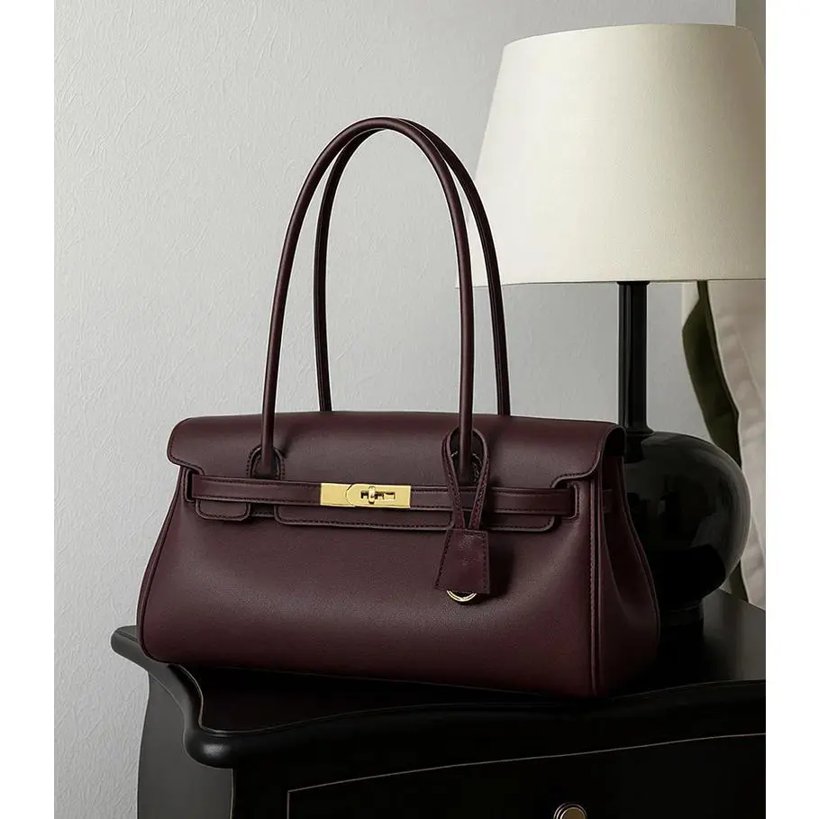 Women's genuine leather handbag/shoulder bag/underarm bag; niche design baguette bag. Women's genuine leather handbag/shoulder bag/underarm bag; niche design baguette bag.