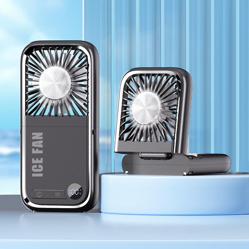 tylish and versatile personal fan with digital display, foldable design, and dual-use for neck hanging or handheld. Built with ice compress cooling technology, USB rechargeable, ultra-portable for outdoor, travel, office and daily use. Low noise, strong w