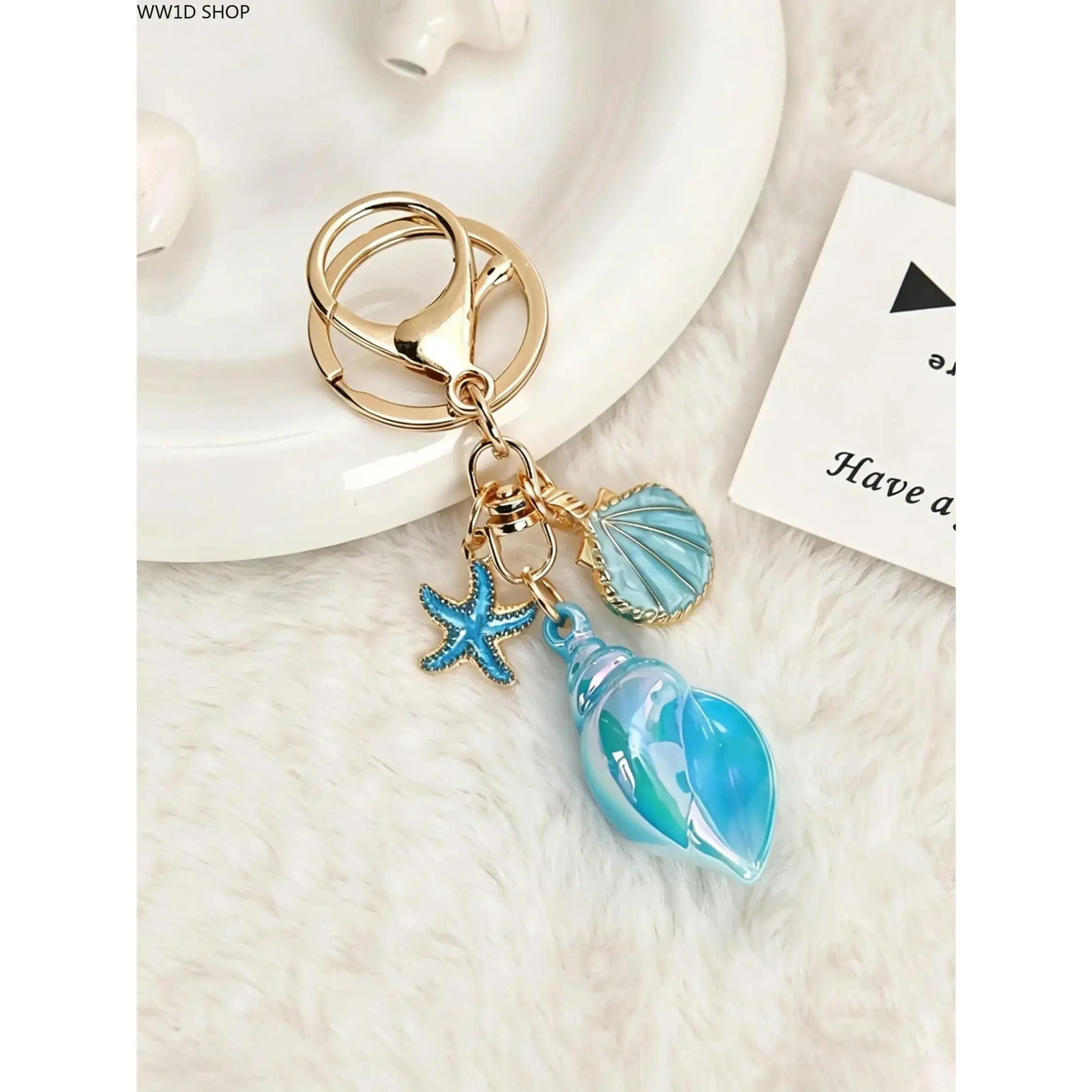 Nautical Iridescent Keychain and Bag Charm with 3D Conch, Seashell, and Starfish Pendants, Coastal Zinc Alloy Anniversary Gift Accessory