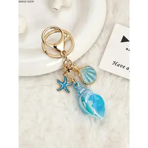 Nautical Iridescent Keychain and Bag Charm with 3D Conch, Seashell, and Starfish Pendants, Coastal Zinc Alloy Anniversary Gift Accessory