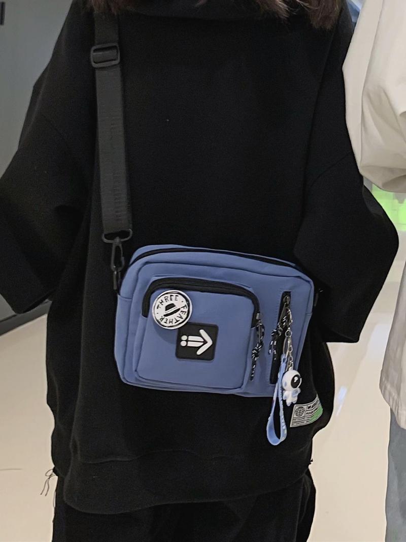 Unisex Casual Plain Color Release Buckle Crossbody Bag with Astronaut Charm, Fashionable Versatile Zipper Crossbody Bag with Random Color Badge, Trendy Shoulder Bag for Daily Use, Adjustable Crossbody Bag