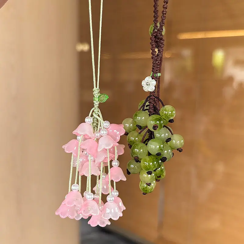 Handmade beaded phone charm—a crystal strap featuring lily-of-the-valley and grape motifs; a cute, anti-loss wrist strap that also serves as a bag charm or backpack pendant—an ideal gift for women. Smartphone Cellphone