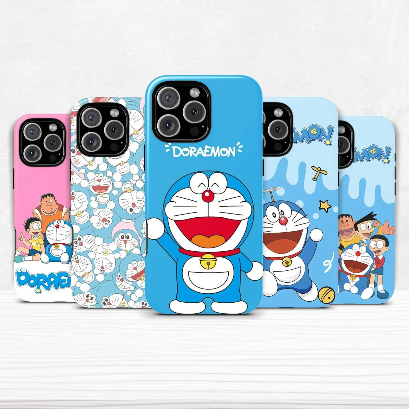 Doraemon dual-layer phone case, compatible with iPhone 11–17 Pro Max/Plus series and Samsung Galaxy S23–S25 series.