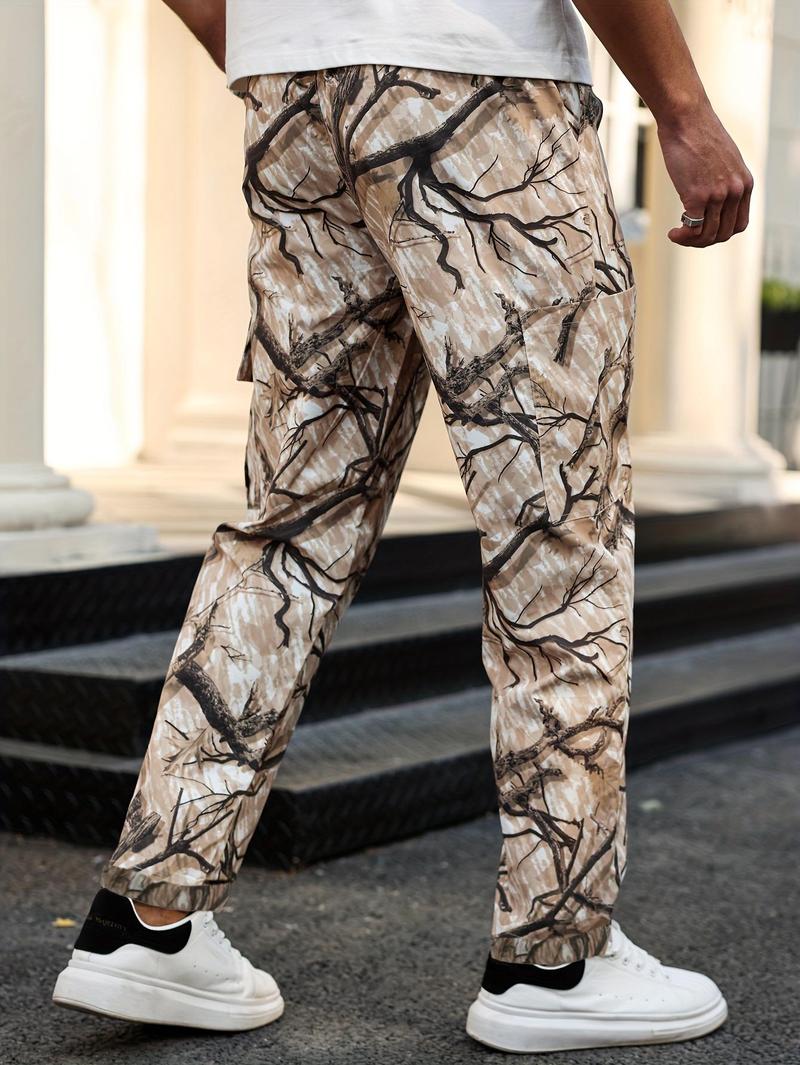 Men's camouflage print zippered pocket trousers, slim-fit athletic pants, durable trousers for autumn, men's wear-resistant outdoor training pants, streetwear fashion, vacation wear, men's clothing
