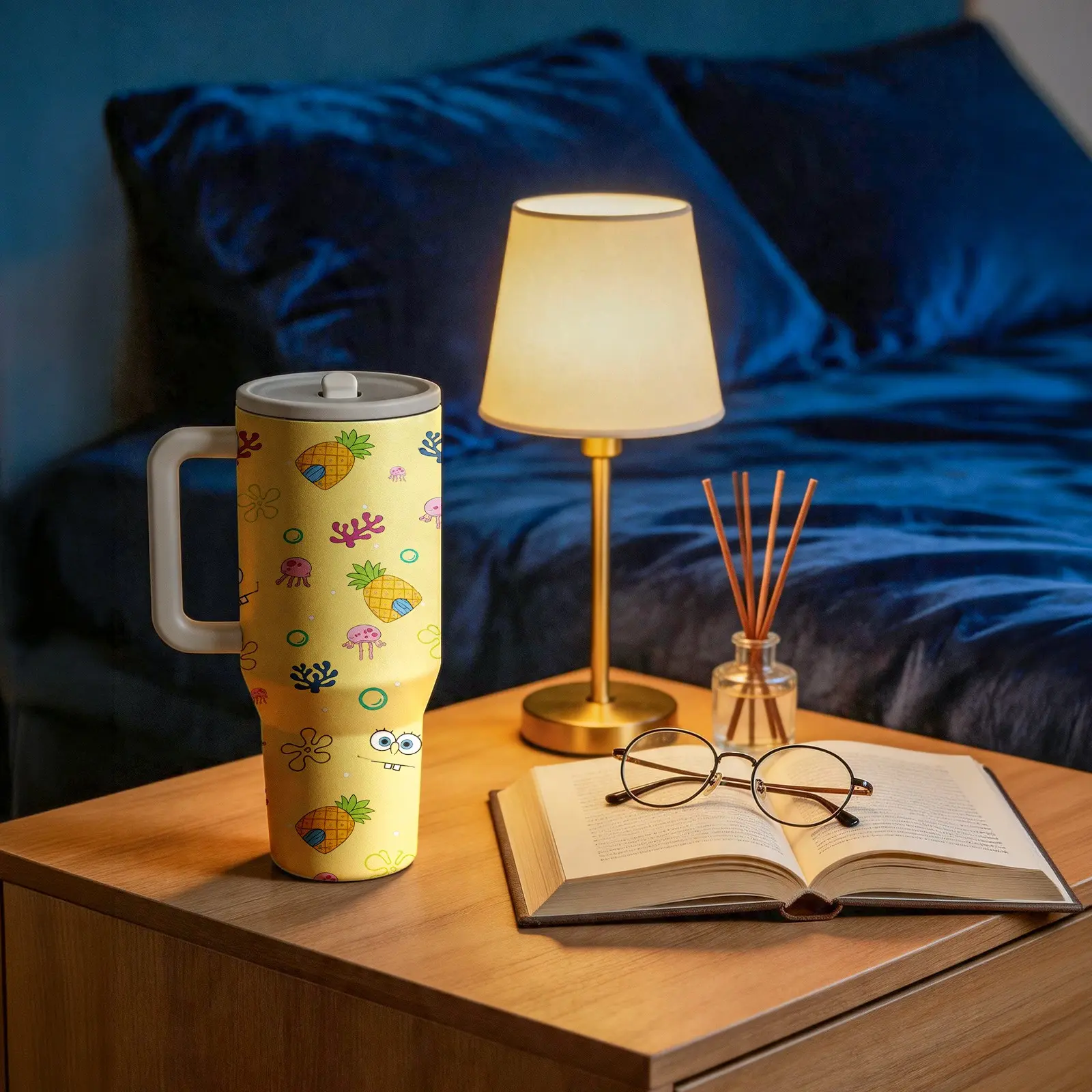 Cute SpongeBob themed insulated tumbler! Features pineapple house, jellyfish and classic Bikini Bottom elements. 40oz large capacity stainless steel cup, keeps drinks cold & warm, perfect gift for cartoon lovers.