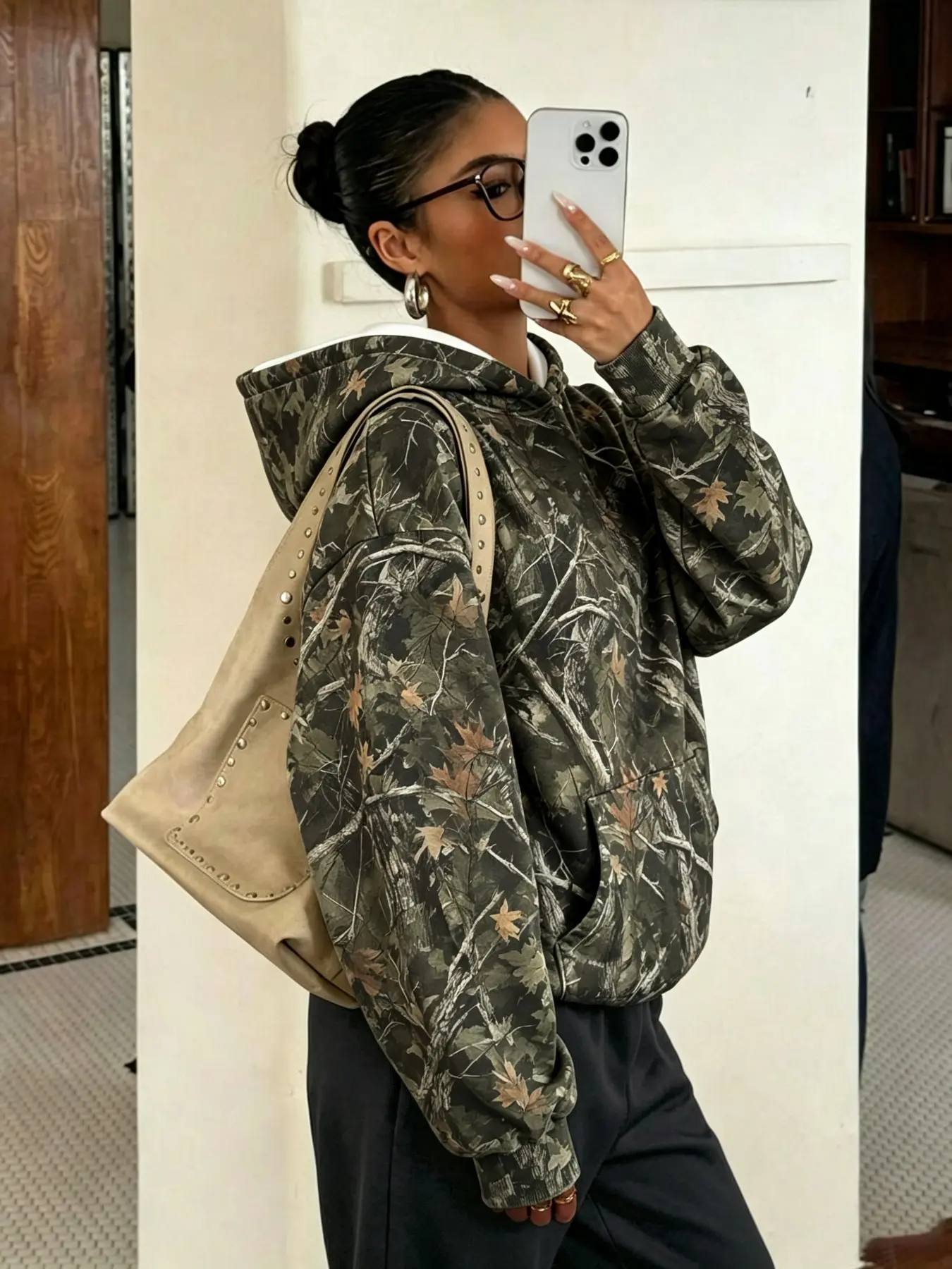 Women's camo hoodie with dead branch tree texture pattern, fleece-lined, drop shoulder loose fit, kangaroo pocket, hooded. Perfect for street style, home wear, graduation, back-to-school, and fall-winter outfits