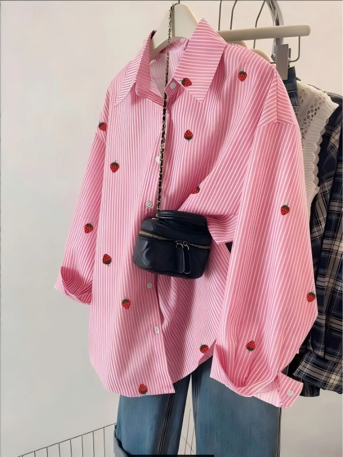 A fashionable pink strawberry striped Loose Casual Blouse Shirt for women, with a hanging fabric that is breathable and suitable for commuting, shopping, outdoor activities, indoor and outdoor wear