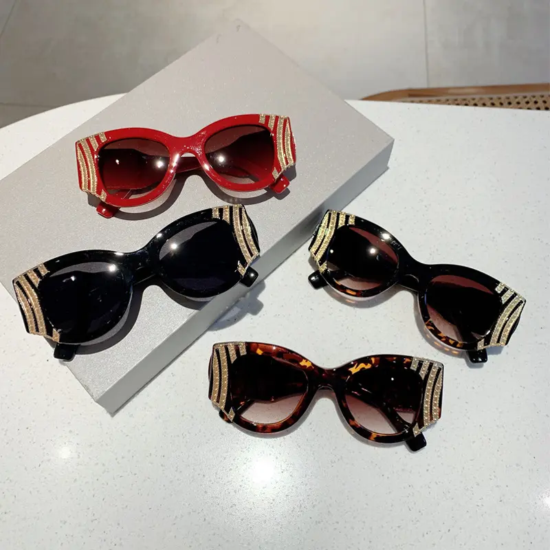 Get this gorgeous 4-pack rhinestone cat eye sunglasses set for your collection. Featuring bold trendy frames adorned with sparkling gold glitter lines. Lightweight durable and ultimate chic for festival looks or party ootds. Tap to shop.