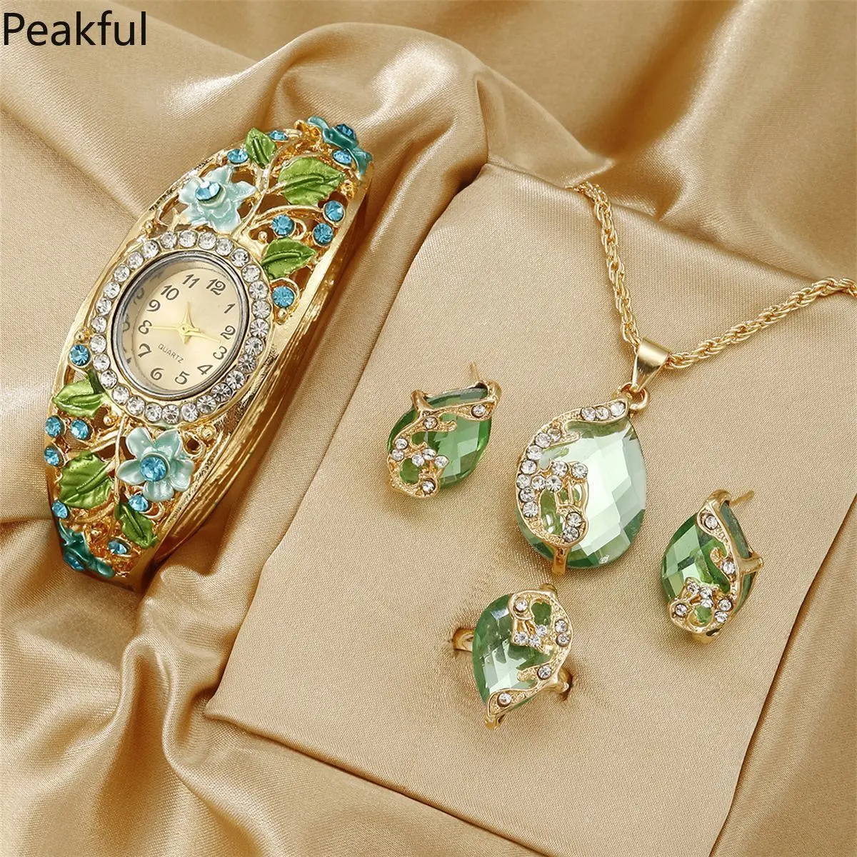 Hot selling vintage floral crystal watch & jewelry collection | Hard-to-find emerald-inspired gold-tone 5-piece set | Includes watch, necklace, earrings & ring, eye-catching design, great for anniversaries, birthdays and holiday gifting