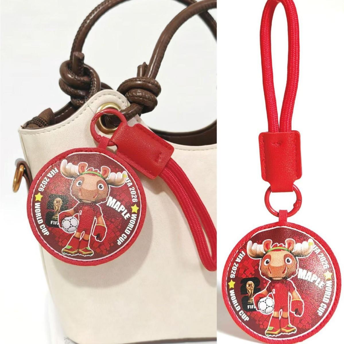 2026 World Cup Mascot Keychain| Cute Maple Zayu Clutch Bag Charm| 2026 North America Soccer Souvenir Pendant| Leather Keyring for Fans & Kids Gift