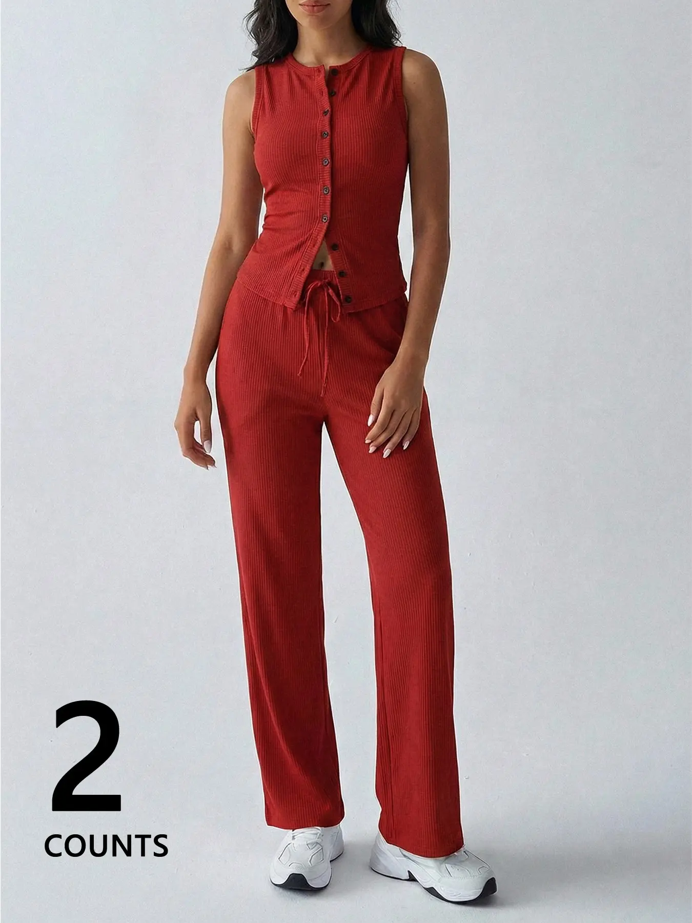 Two-piece women's knitwear set: sleeveless button-down vest top + drawstring wide-leg trousers, a casual and complete loungewear set.