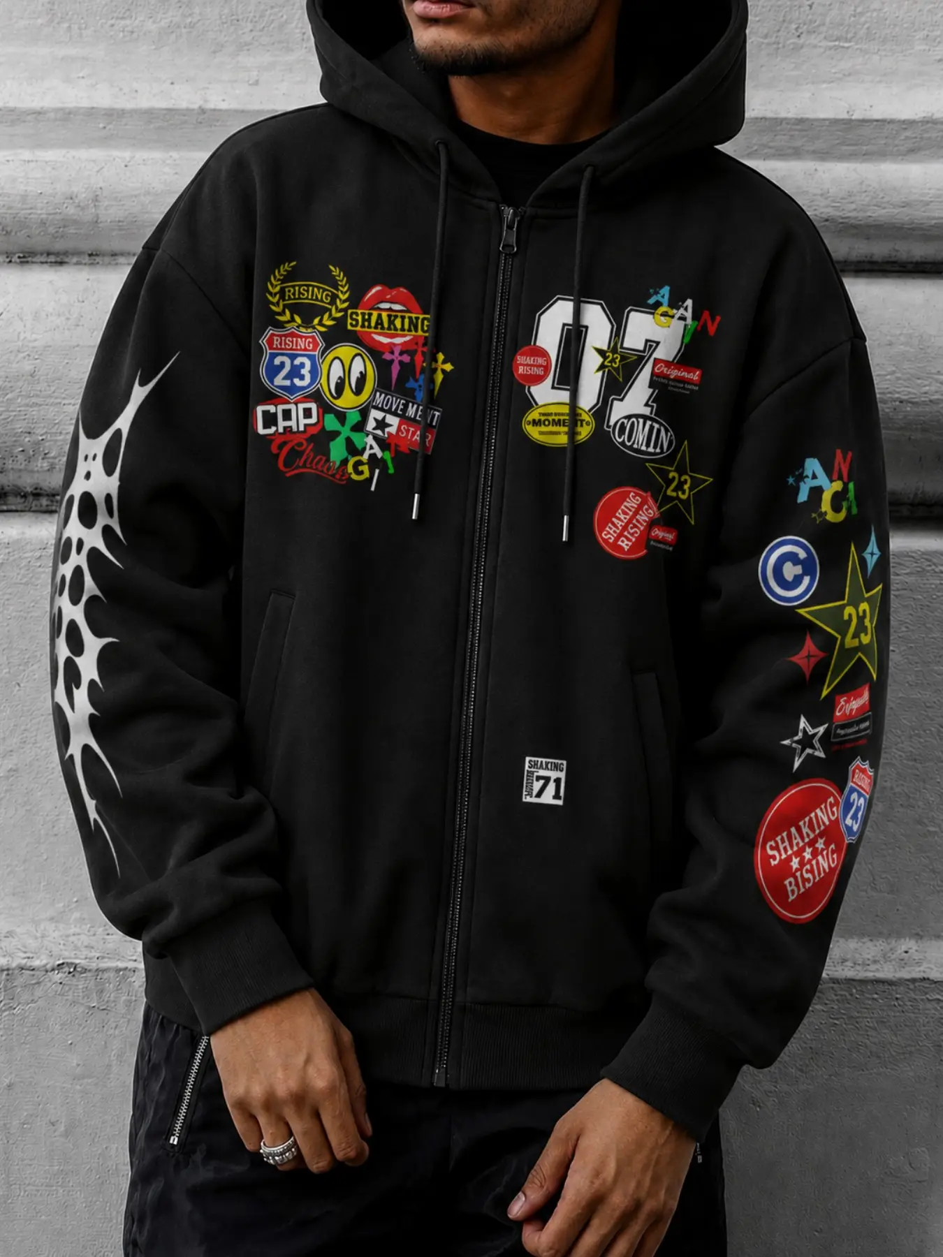 Men's Black Graphic Zip-Up Hoodie, Oversized Hooded Jacket with Colorful Patch-Style Prints on the Front and Sleeves, Retro Y2K Streetwear Top for Spring, Fall, Campus Looks, Skate Outfits, Music Festivals, Casual Outings, Layering, and Weekend Wear