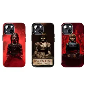 Annabelle Classic Horror Movie Hard Case Phone Case, deep red fog background, eerie doll portrait, retro warning label design, drop-proof, durable, ultra-thin phone case, suitable for iPhone 11–17 Pro Max/Plus series and Samsung Galaxy S23–S25 series.