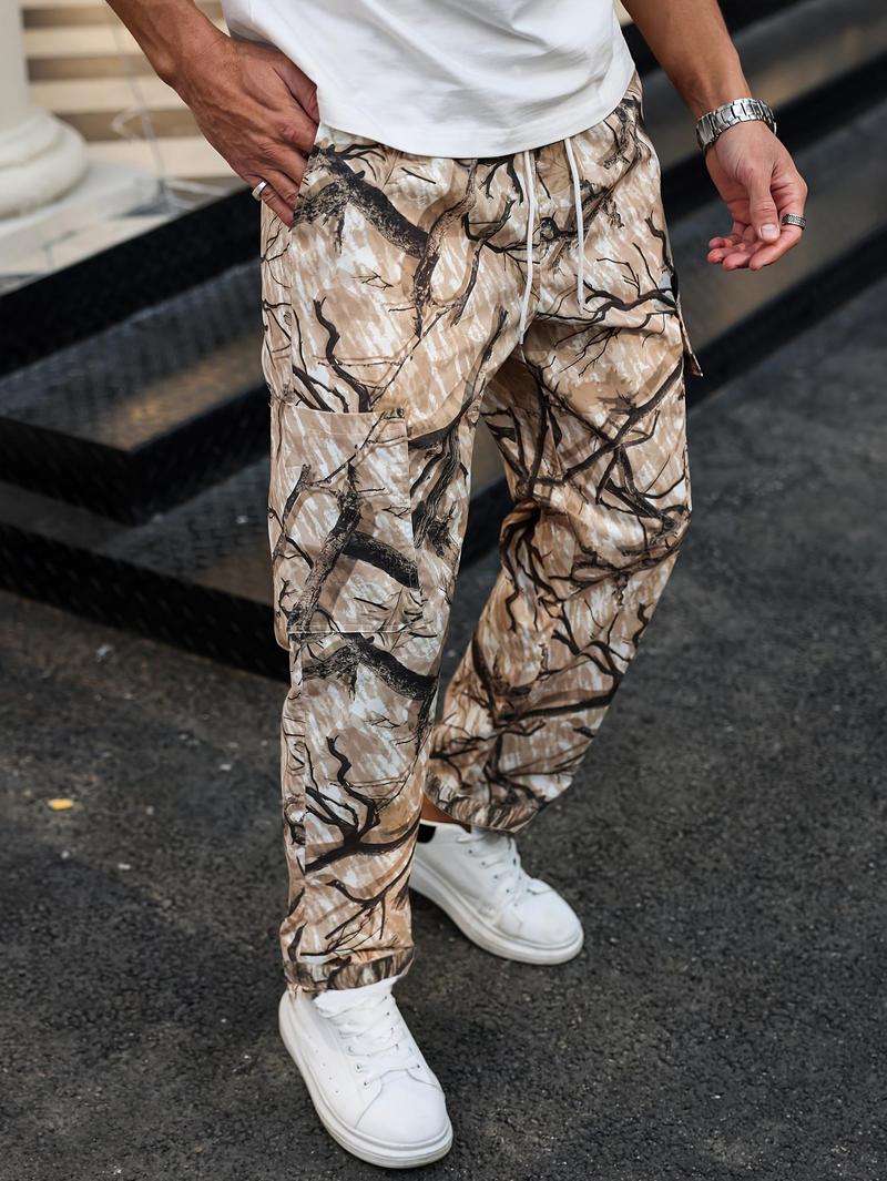 Men's camouflage print zippered pocket trousers, slim-fit athletic pants, durable trousers for autumn, men's wear-resistant outdoor training pants, streetwear fashion, vacation wear, men's clothing