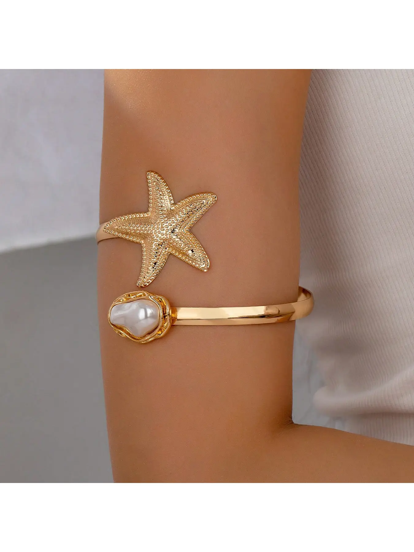 Best-selling in Europe and America, ocean vacation style decorative starfish-shaped faux pearl adjustable open upper arm bracelet for women