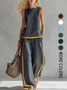 A set of women's fashionable color blocked sleeveless wide leg two-piece set with contrasting colors and breathable surface suitable for commuting, daily indoor and outdoor wear. Multiple colors are available for selection