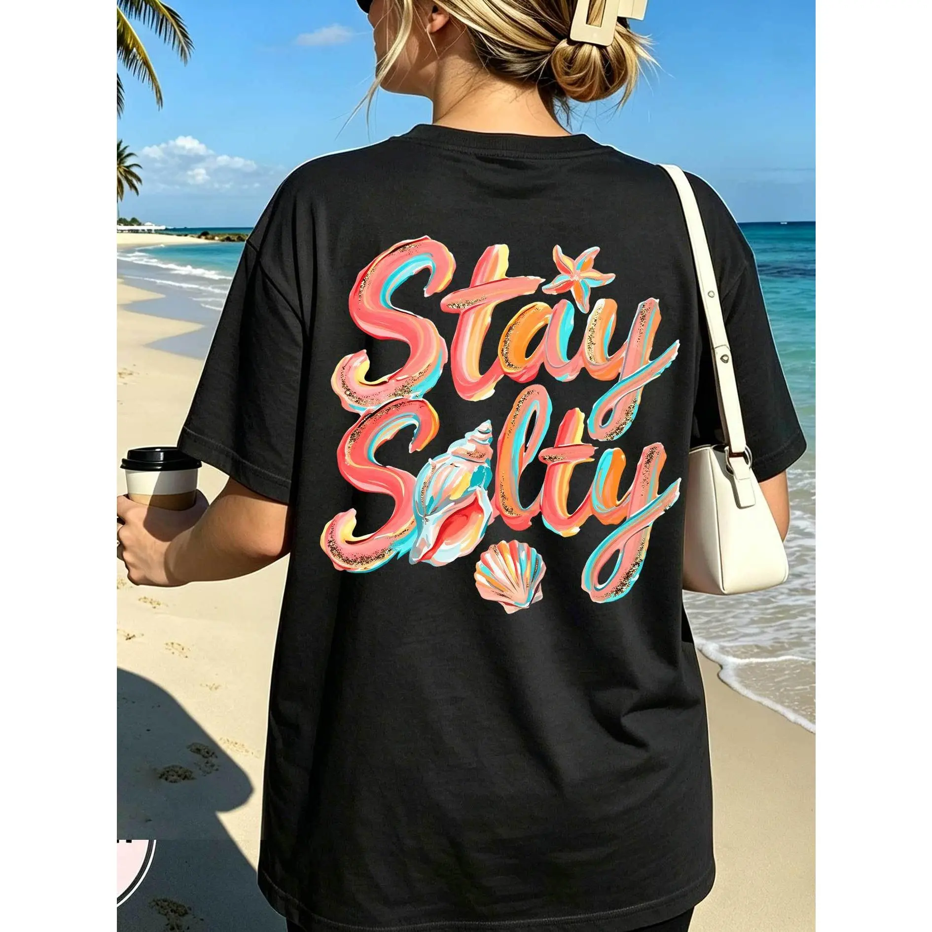 Hawaiian Style Beach Vacation "Stay Salty" T-Shirt with Seashell Back Print.Crew Neck for Travel, Daily Commute, and Photoshoots.Vintage Style for Women.Casual Sportswear for Spring and Summer.