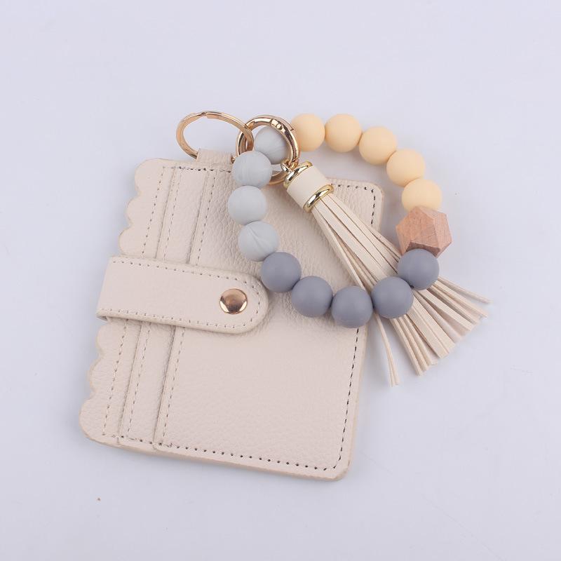 Silicone bead bracelet card holder accessories, silicone bead wristband, PU tassel women's wallet, leather tassel keychain