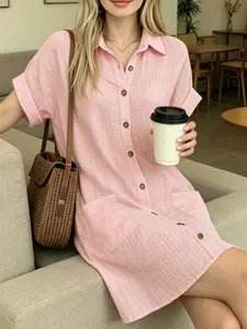 A women's fashionable casual short-sleeve collared shirt dress with pockets, versatile and mid-length, suitable for summer, home, beach, outdoors, and travel wear.