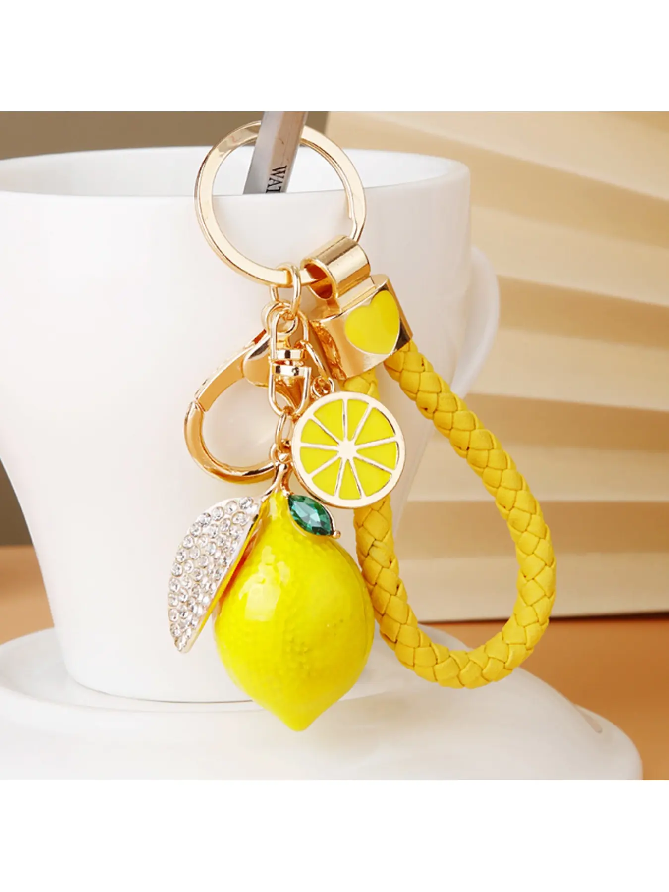 1pc Lemon Keychain with Rhinestone Leaf - Creative Fruit Charm for Car Keys, Bags & Purses. Yellow Braided Strap & Gold Metal Clasp Accessory. Cute Summer Vibe Gift for Women, Girls & Friends. Perfect for Birthday, Summer Party or Holiday Gif