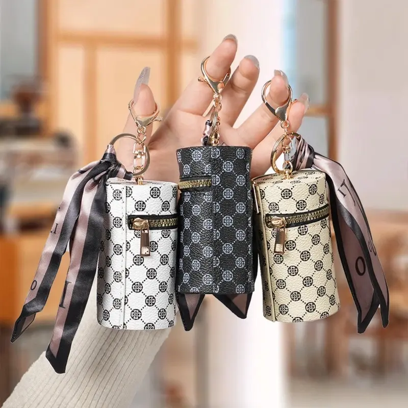 High-end luxury coin purse pendants, earphone cases, lipstick mini keychain bags, retro bucket mouth red envelopes, and simple p