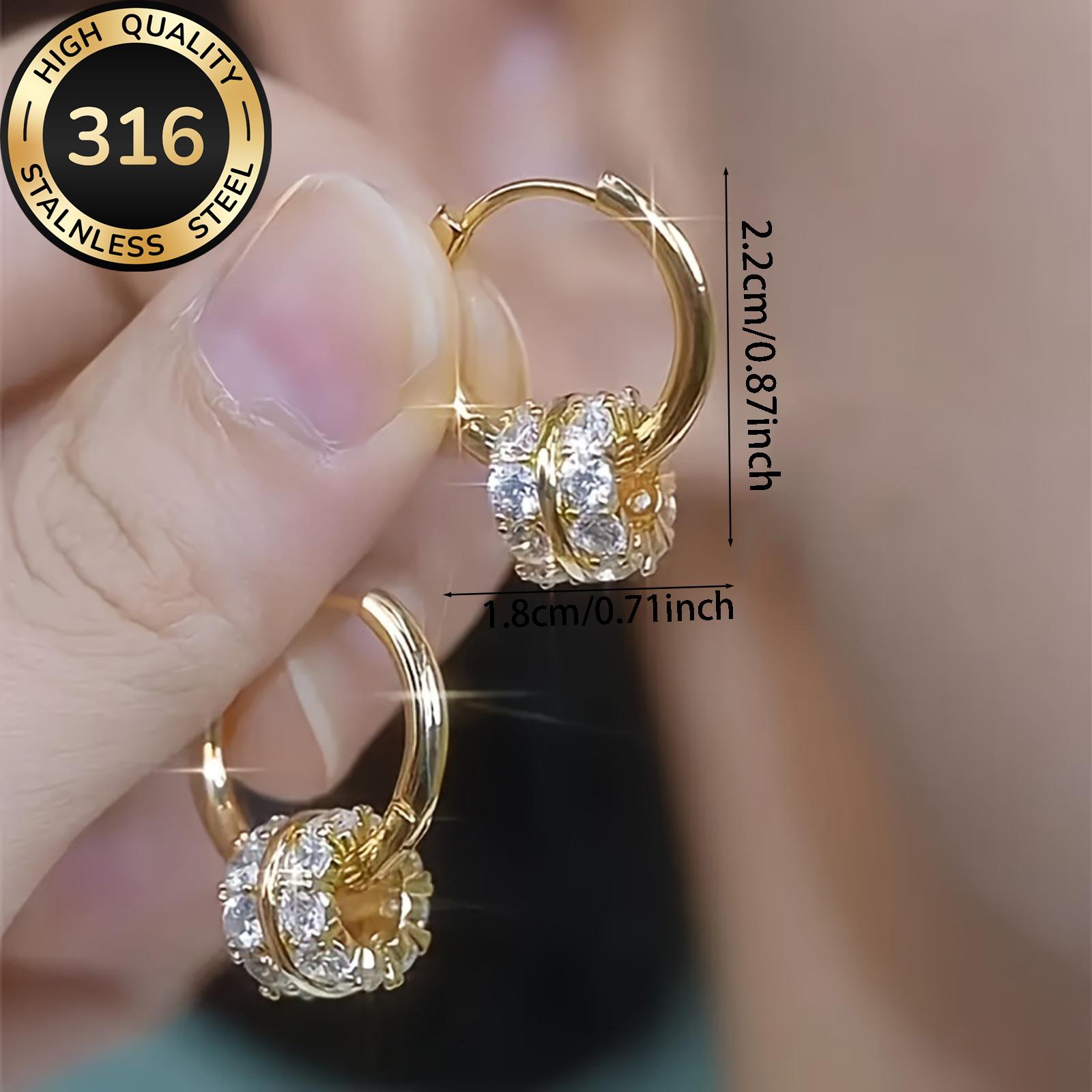 A pair of luxurious hoop earrings made of hypoallergenic 316 stainless steel with synthetic zirconia stones, featuring a minimalist design, a jewelry gift for women.