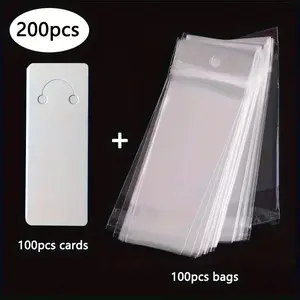 200 pieces packaging set: 100 white cards and 100 sealed bags, suitable for DIY hair accessories and jewelry.