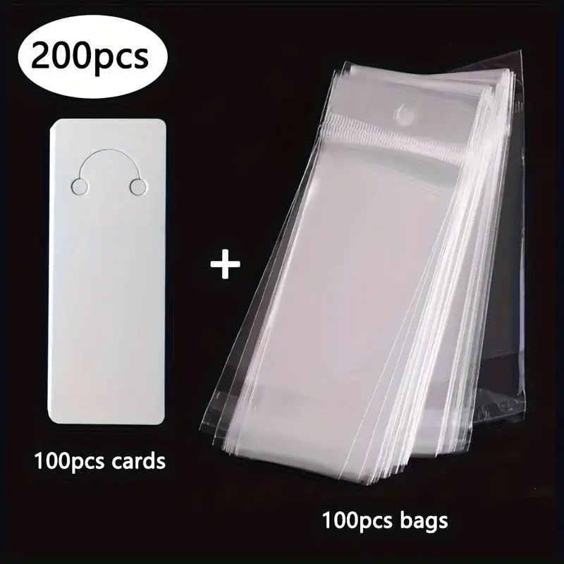200 pieces packaging set: 100 white cards and 100 sealed bags, suitable for DIY hair accessories and jewelry.