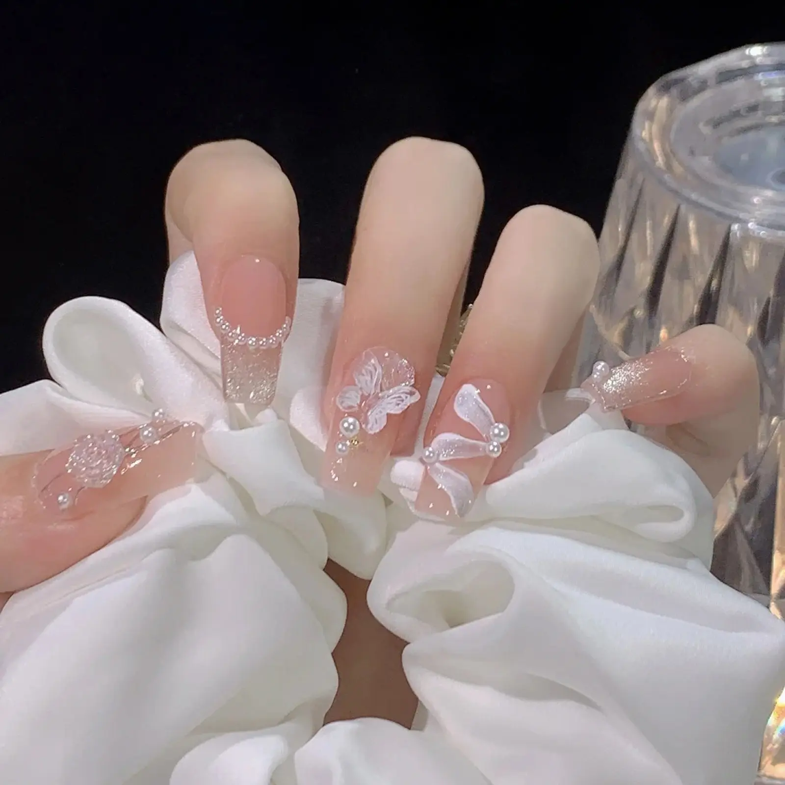 30 Pcs Ballet Almond Press-On Nails, Glittering Fake Nails, Nude Base with Butterfly, Silver Glitter, Pearl Decor, Reusable, Includes Jelly Glue and File