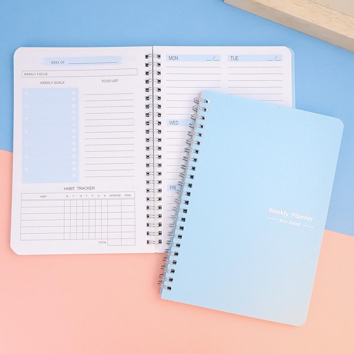 Weekly planner notebook open layout view