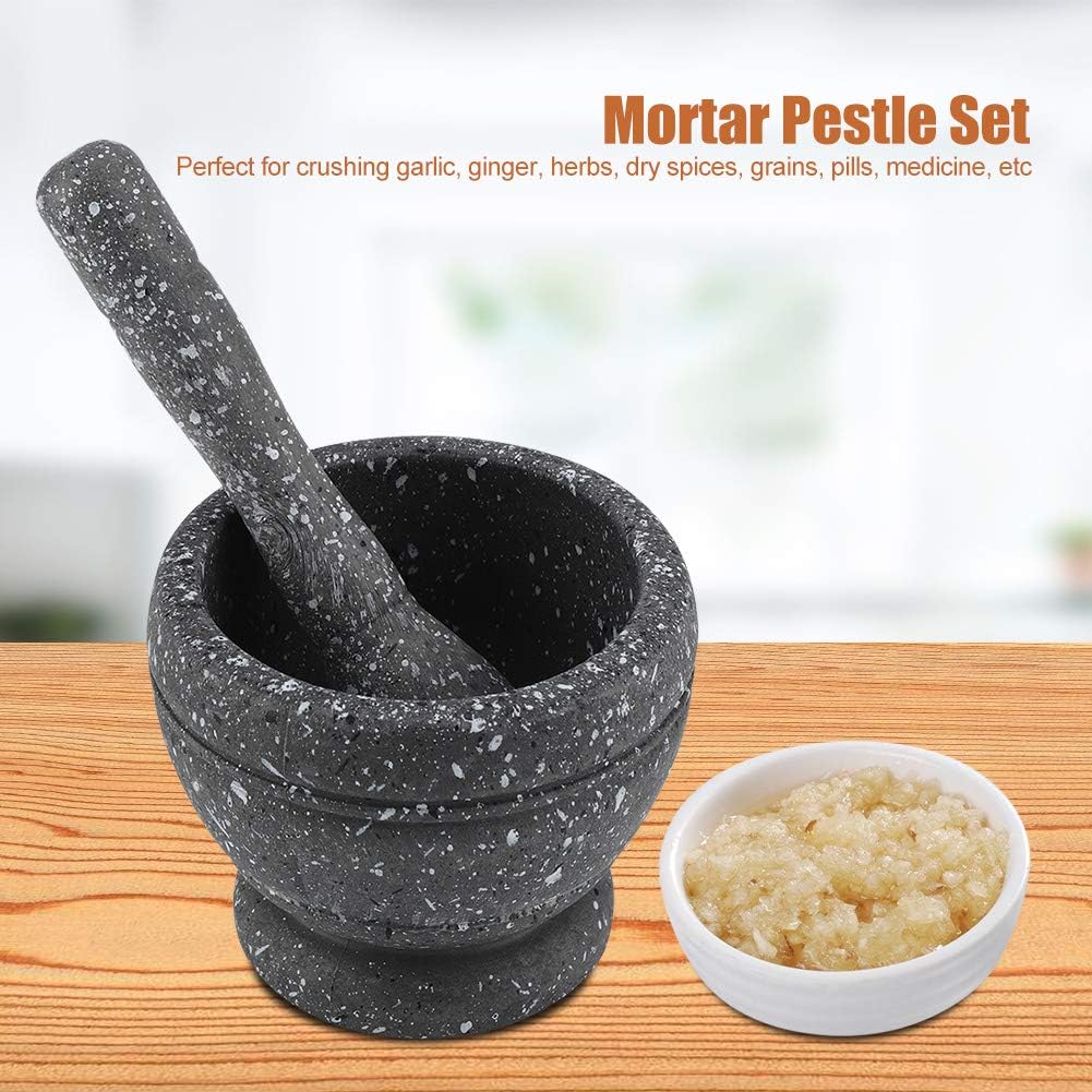 A practical garlic grinder with a mortar, a multi-functional manual food grinder, a kitchen crushing tool, a household garlic grinder, and a spice tool