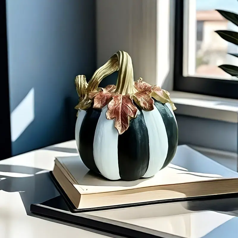Black and white checkered pumpkin resin decorative piece, a fall-style tabletop decoration item that can be placed indoors or outdoors. Suitable for home scene arrangement during Halloween and Thanksgiving. Decorates the home tabletop and garden space.