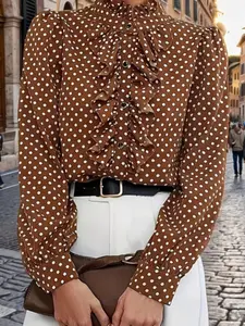 A ladies' brown polka dot ruffled stand-up collar long-sleeved bubble blouse shirts for an elegant chic style outfit