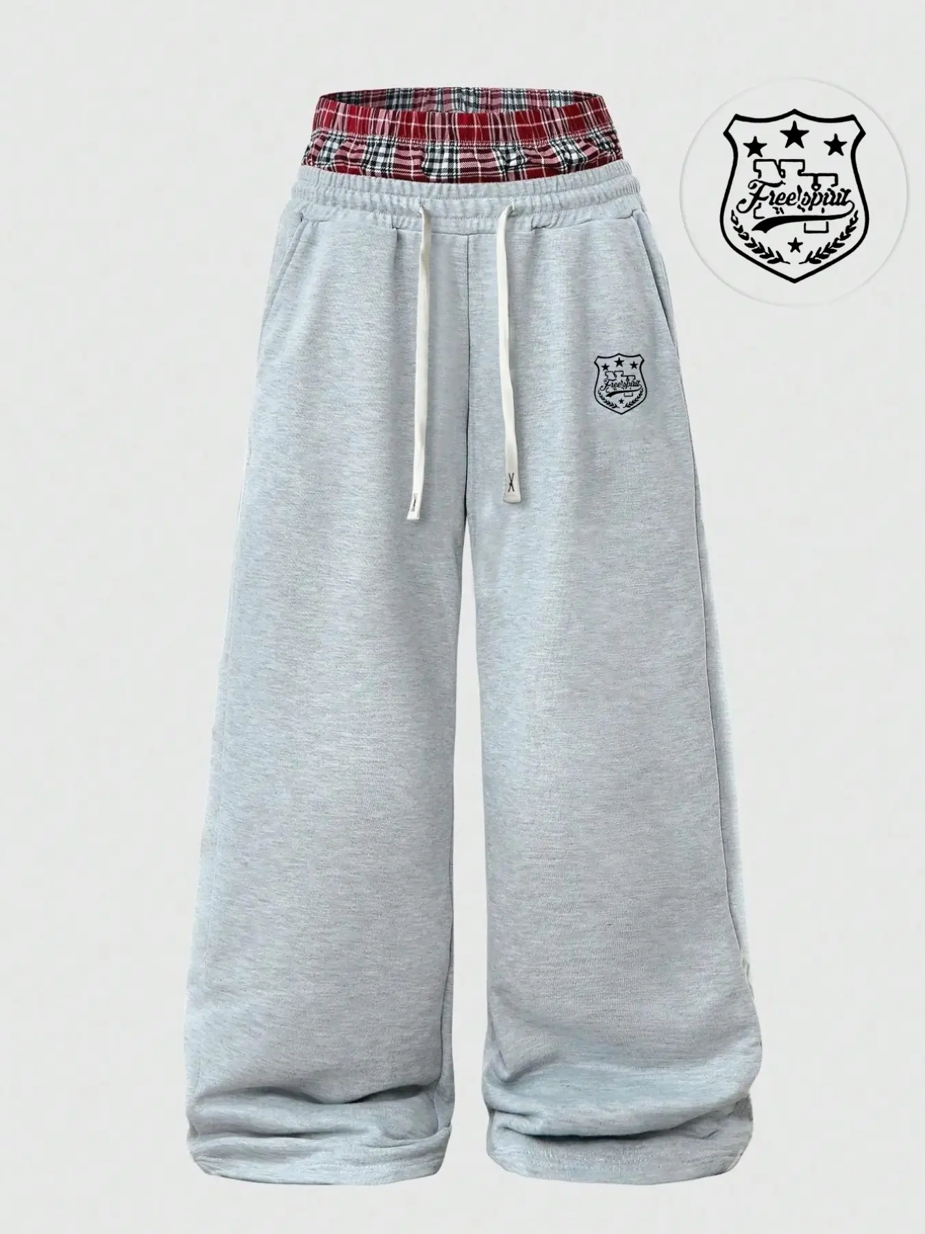 Double-layered plaid patchwork wide-leg sweatpants, light heather gray loose floor-length style, hidden badge print, retro distressed line drawing pattern, soft knit fabric, subculture Y2K street casual trousers unisex style.
